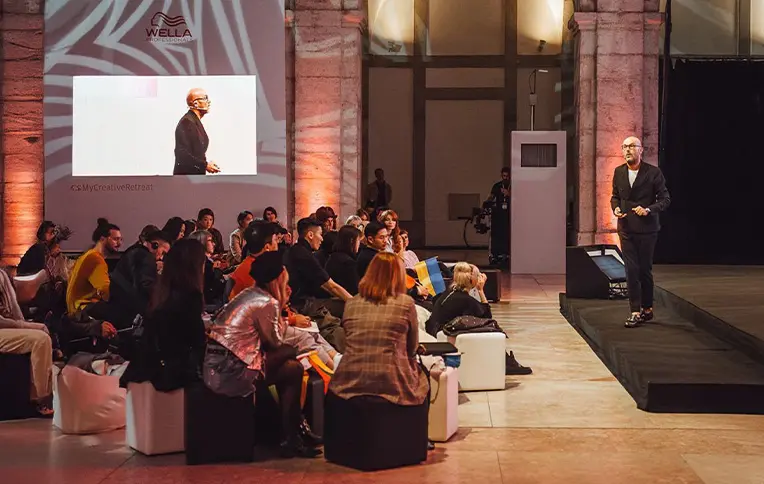 Rossano Ferretti speaking to an audience
