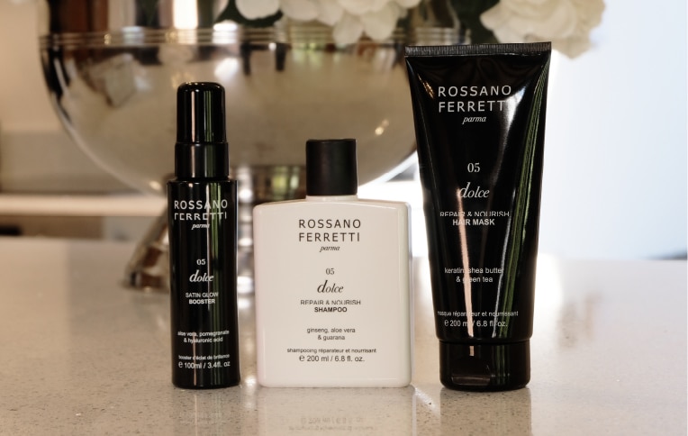 Image of Rossano Ferretti Parma's Dolce nourishing routine with the nourishing shampoo, the repair and nourish mask and the satin glow booster spray.