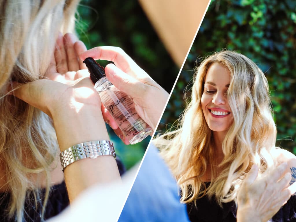 Image of a blonde girl with wavy hair applying Prodigio regenerating oil to her hands.