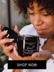 Image of a girl smelling the Intenso smoothing mask by Rossano Ferretti Parma.