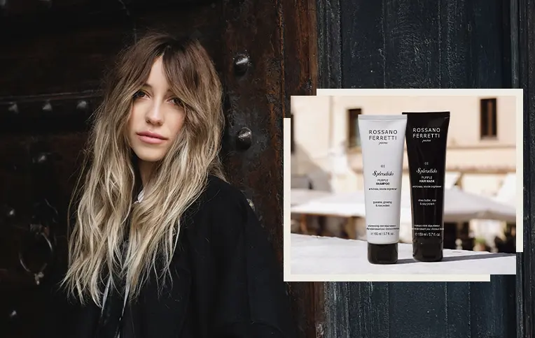 girl with long blonde hair with the products from the Splendido Purple shampoo and Mask by Rossano Ferretti Parma. 