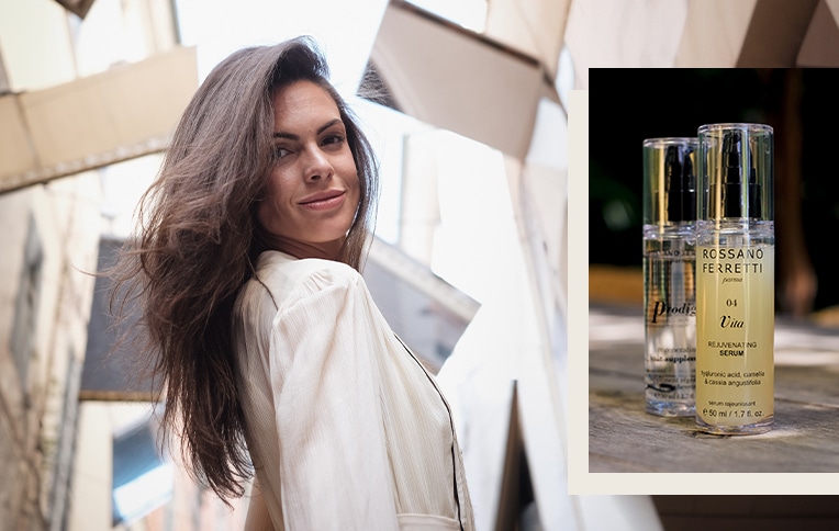 image of a brunette woman with long hair, alongside Rossano Ferretti Parma's rejuvenating Vita serum and regenerating Prodigio oil featured in the photo.