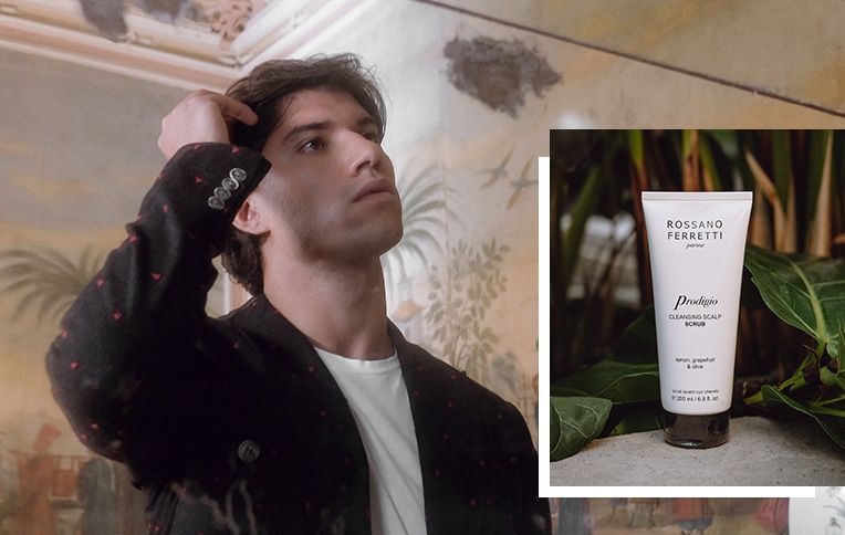 Image of a men alongside Rossano Ferretti Parma's Prodigio scalp scrub.