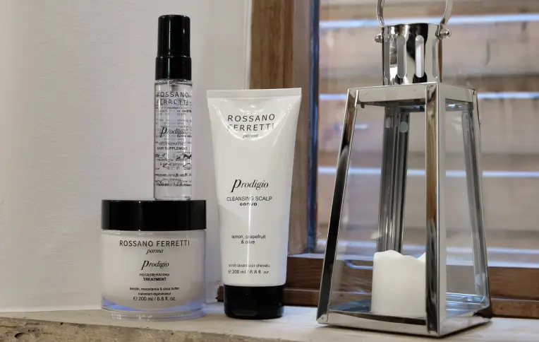 Rossano Ferretti Parma's Prodigio collection with the cleansing scalp scrub, the regenerating treatment and the regenerating oil.