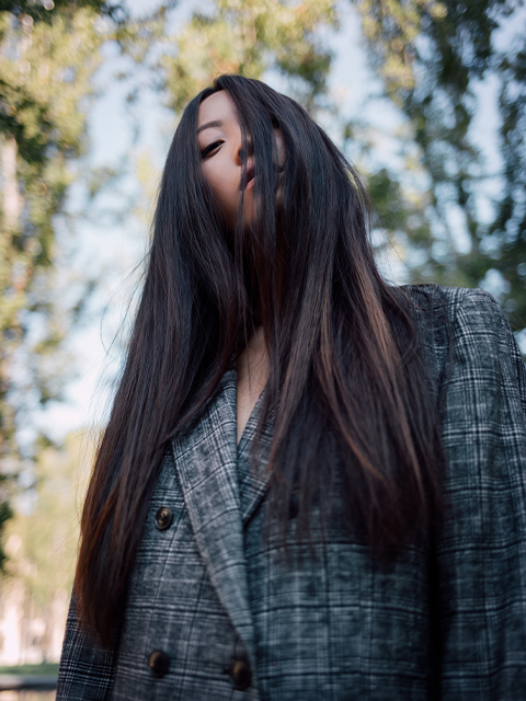 Image of an Asian girl with very long, dark, and straight hair.