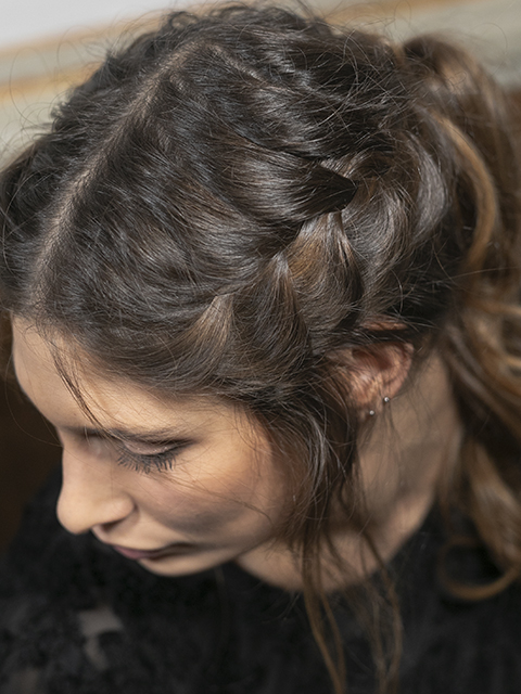 Image of a side braid hairstyle on a brunette girl.