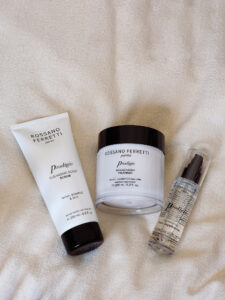 Image of Rossano Ferretti Parma's Prodigio collection with the cleansing scalp scrub, the rejuvenating treatment and the regenerating oil.